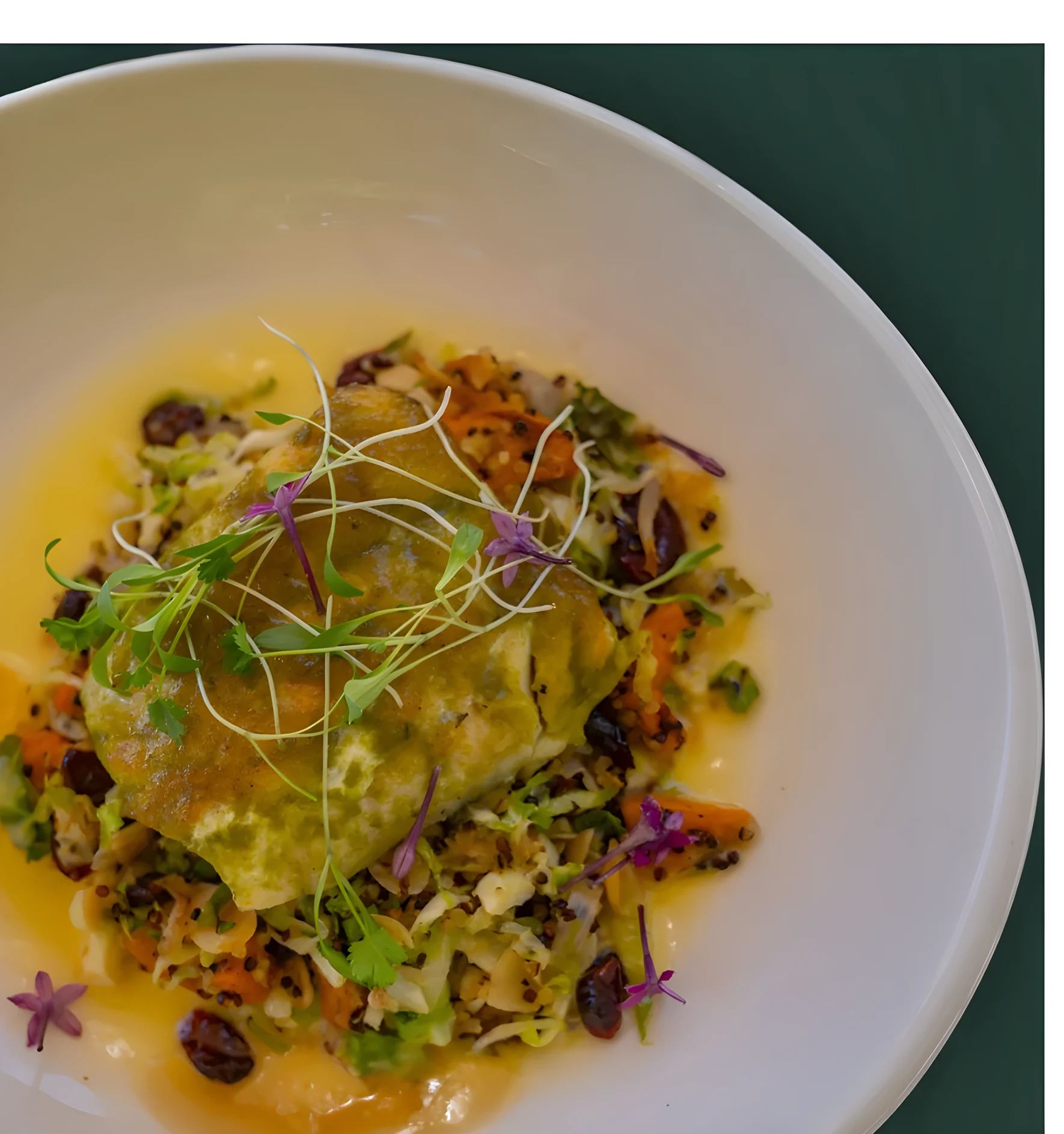 A bright plate of blue crab and artichoke with herbs